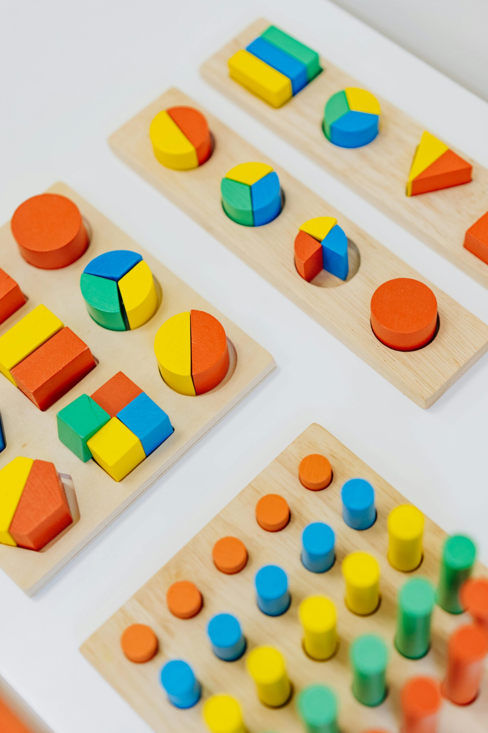 Home_Evolukit_WIP Vibrant wooden toys are ideal for preschool learning and playroom decor.
